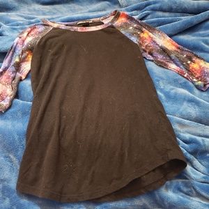 A medium sleeved galaxy shirt